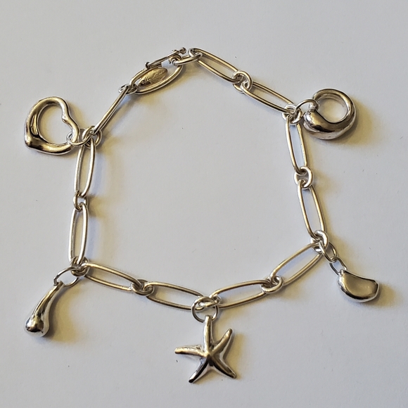 Tiffany & Co. Jewelry - Tiffany & Co. Elsa Peretti 5 Charm Silver Bracelet